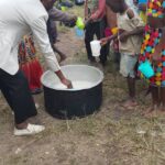 DIRECTOR serving porridge